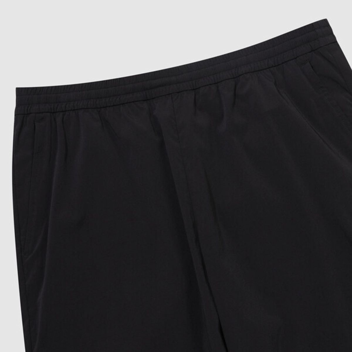 엄브로(UMBRO) PTR 우븐 워밍업 조거 팬츠 블랙 UR121SPT39
