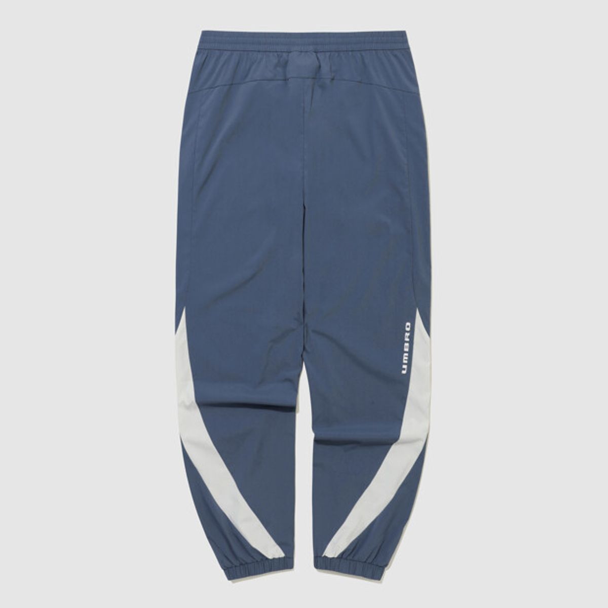 엄브로(UMBRO) PTR 우븐 워밍업 조거 팬츠 블루 UR121SPT39