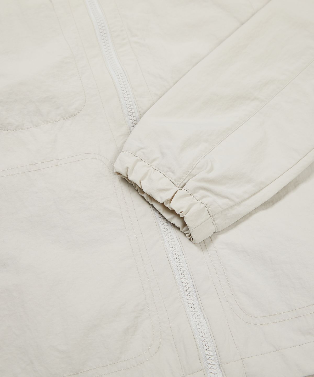 스노우피크 어패럴(SNOWPEAK APPAREL) S23MWLWB52 타슬란 우먼스 세미크롭 바람막이 Light Beige