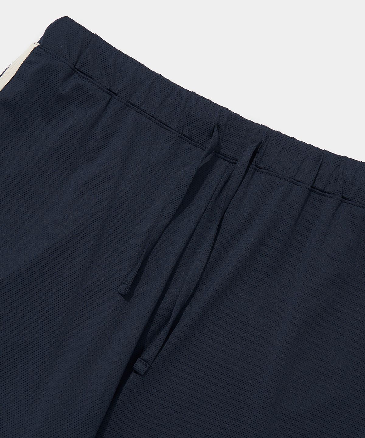 컬럼비아 유니버시티(COLUMBIA UNIVERSITY) SIDE LINE LOOSE FIT MESH TRACK PANTS_NAVY