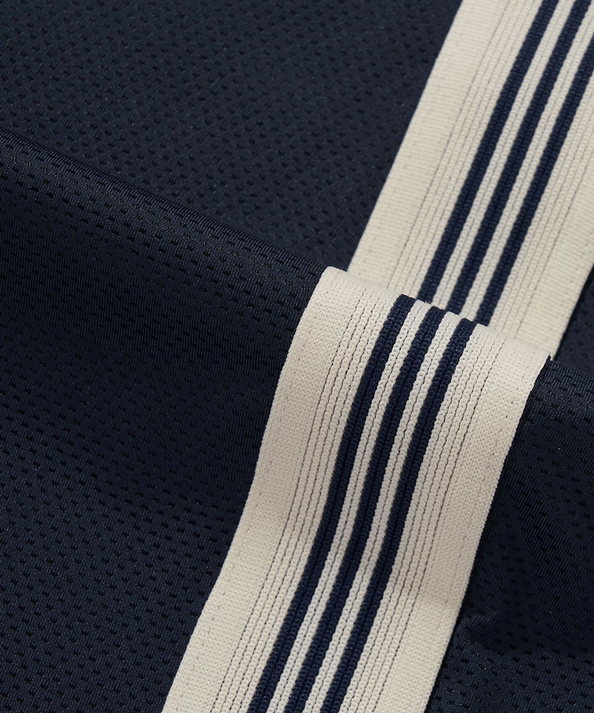 컬럼비아 유니버시티(COLUMBIA UNIVERSITY) SIDE LINE LOOSE FIT MESH TRACK PANTS_NAVY