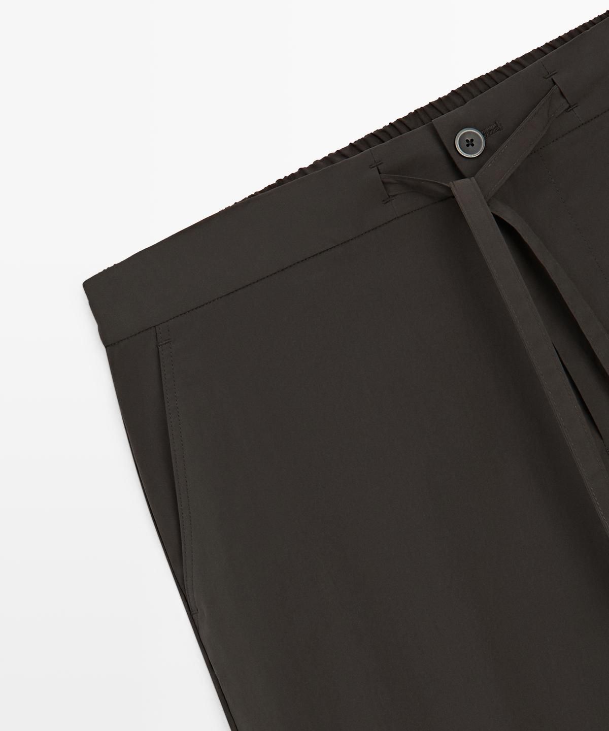 마시모두띠(MASSIMO DUTTI) 하이테크 토탈룩 팬츠