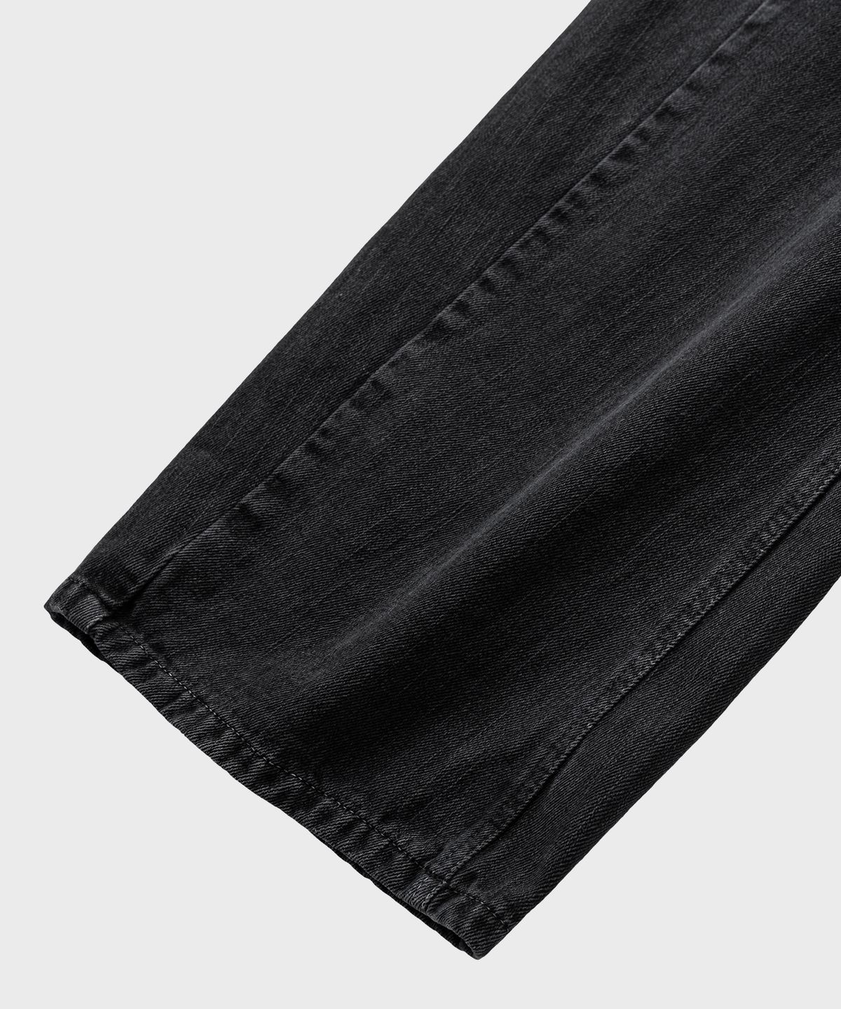 넌블랭크(NONBLANK) 가먼트 다잉 커브드 데님 팬츠_DARK GREY