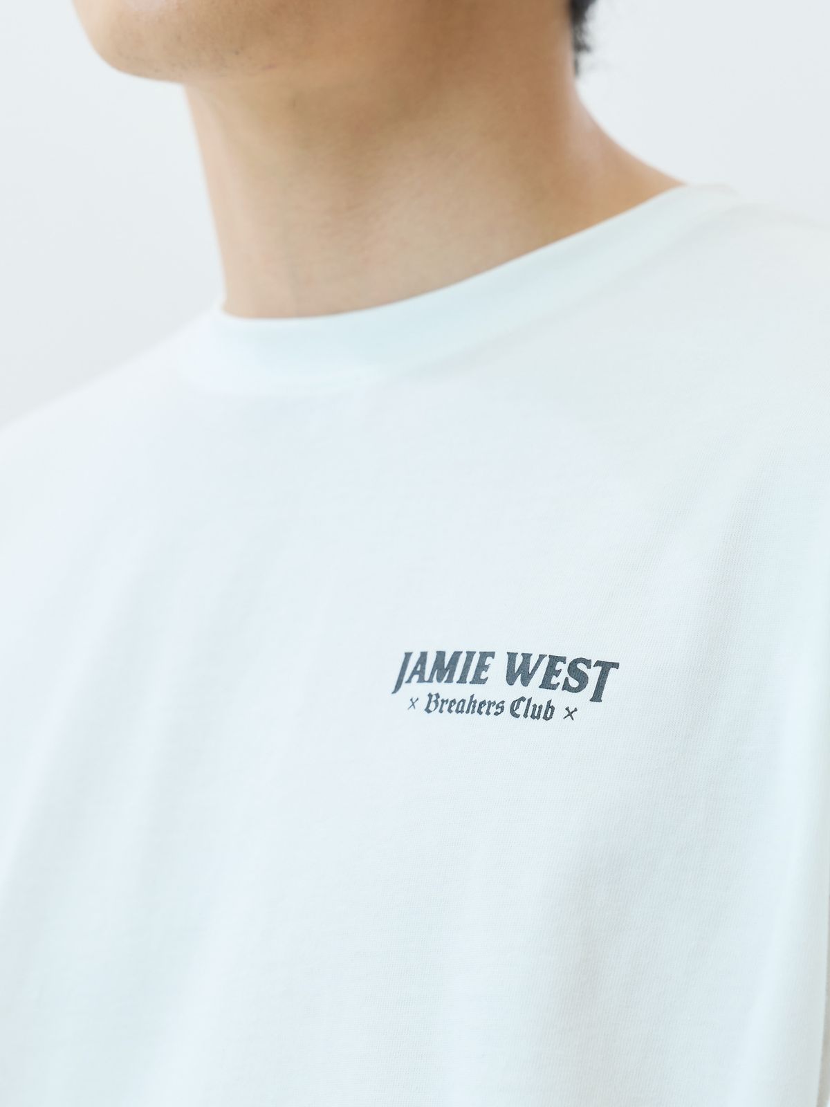 제이미웨스트(JAMIE WEST) 레터링 그래픽 롱슬리브 티셔츠 (화이트)