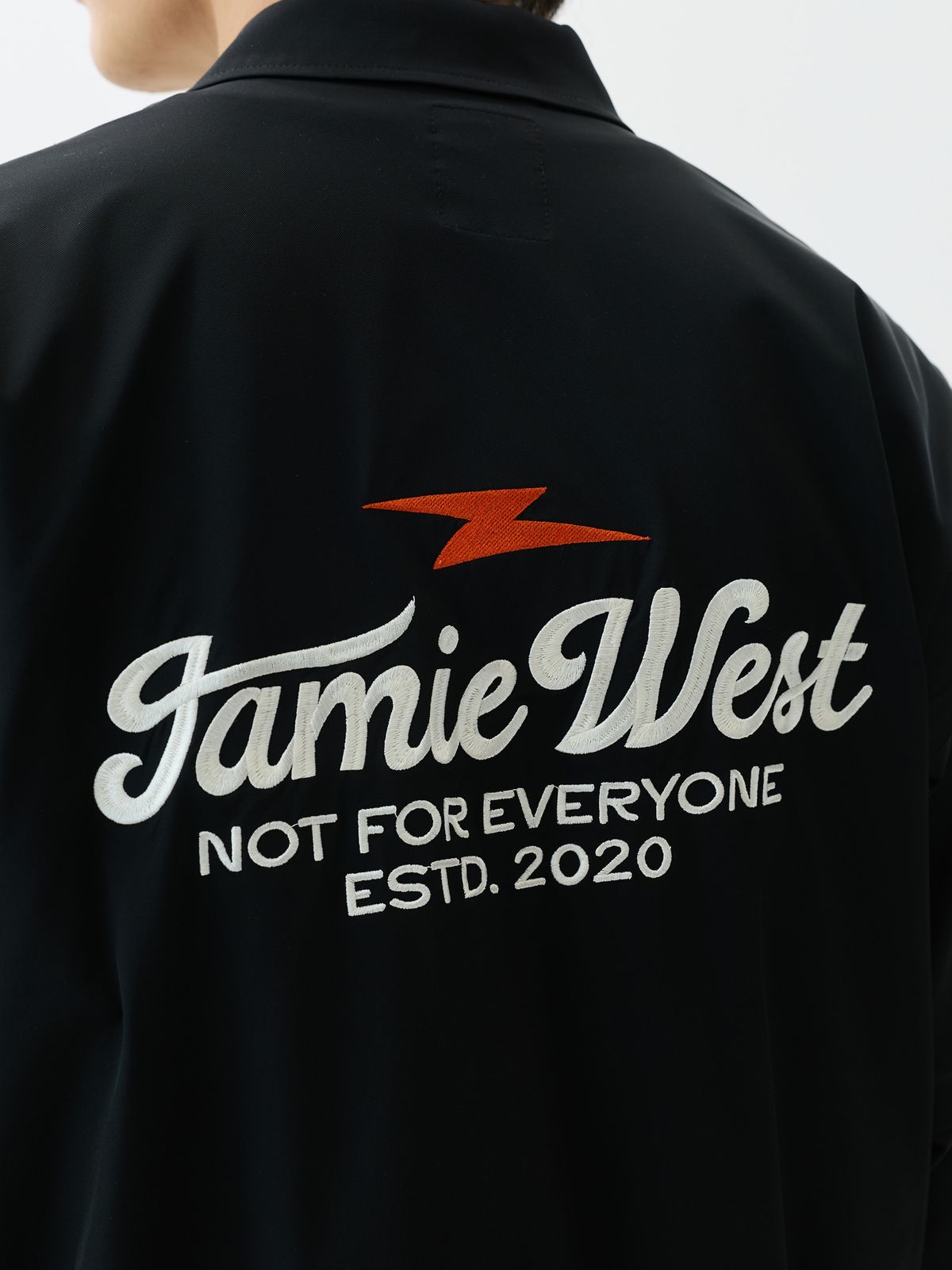제이미웨스트(JAMIE WEST) 디테쳐블 슬리브 레트로 레터링 점프수트 (블랙)