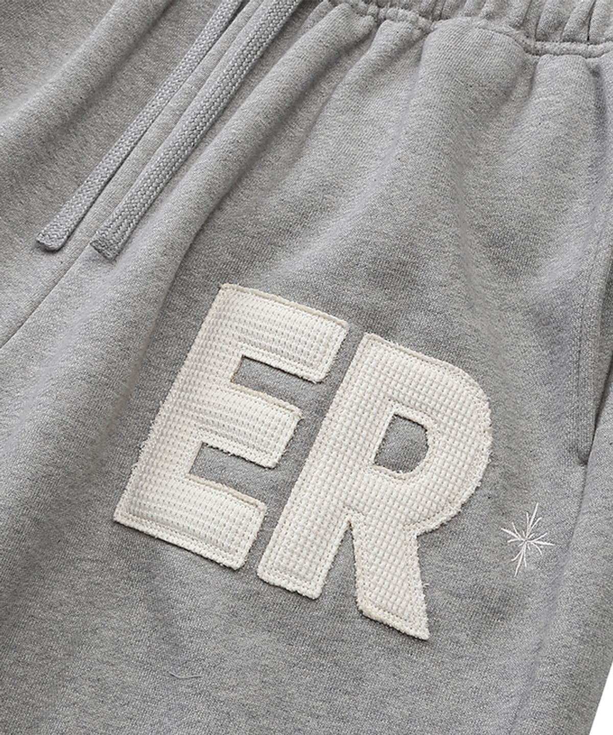 이이이알알알(EEERRR) ER waffle applique long sweat pants (Melange)