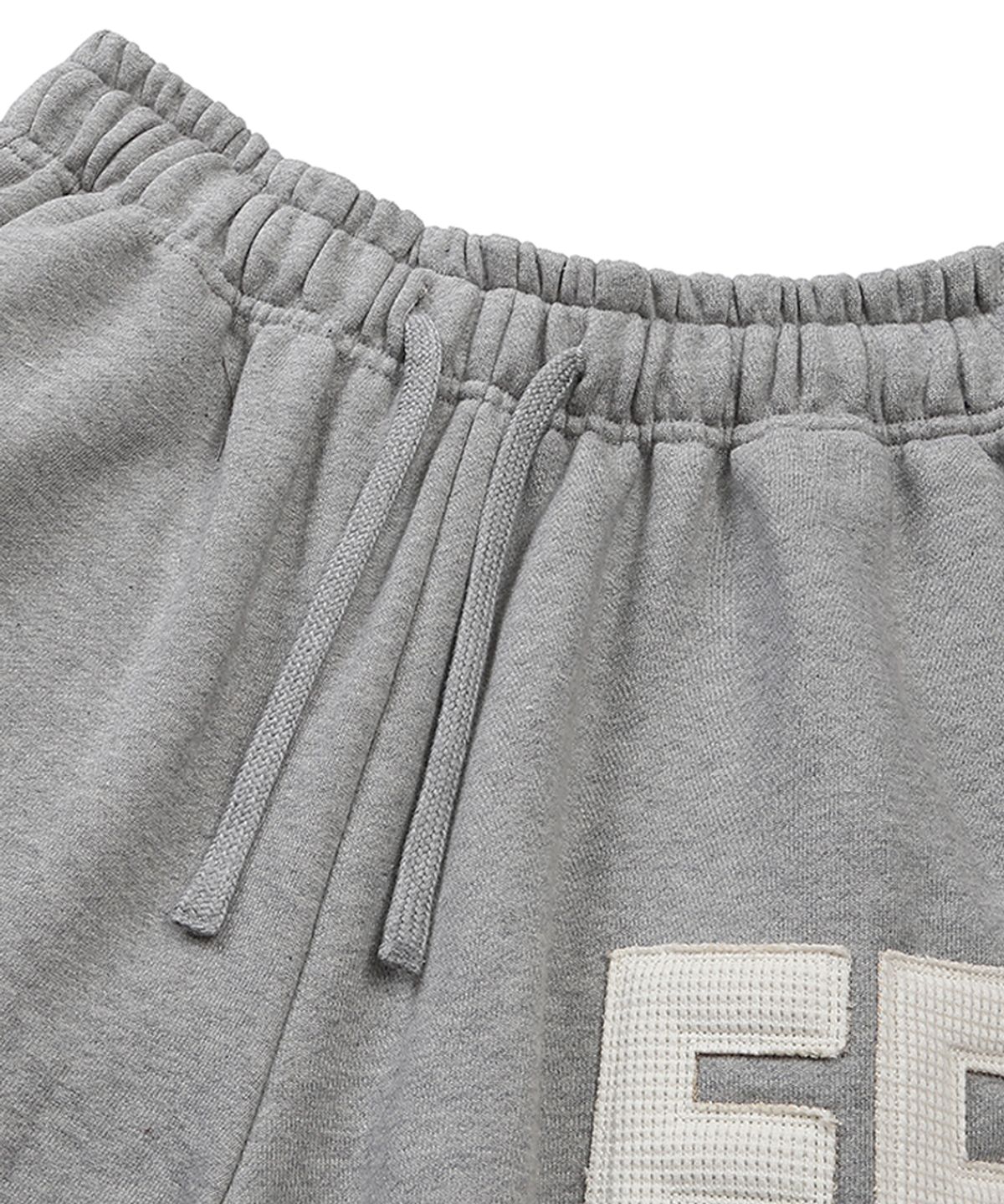 이이이알알알(EEERRR) ER waffle applique long sweat pants (Melange)