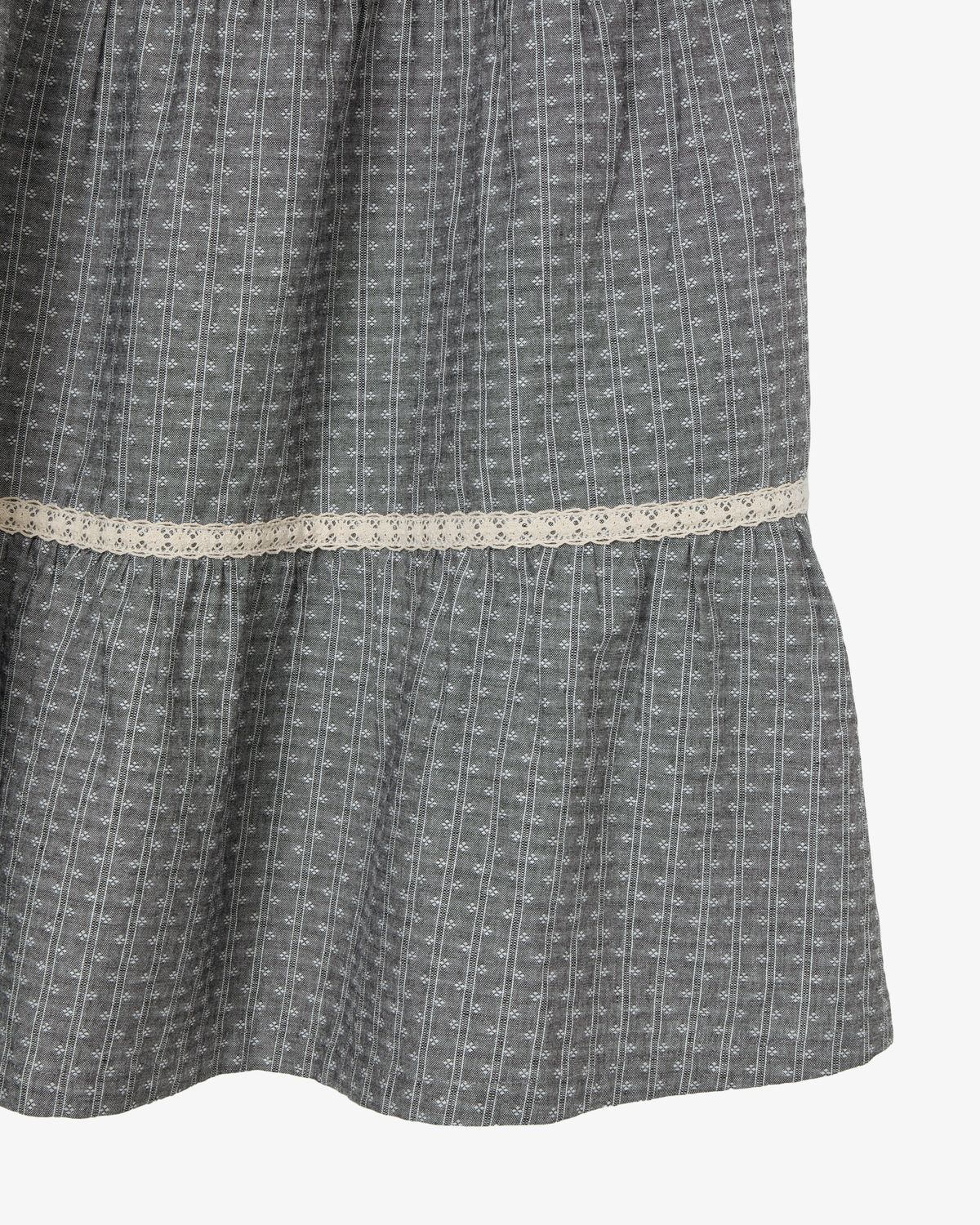 에이이에이이(AEAE) PATTERN TIERED SKIRT [CHARCOAL]