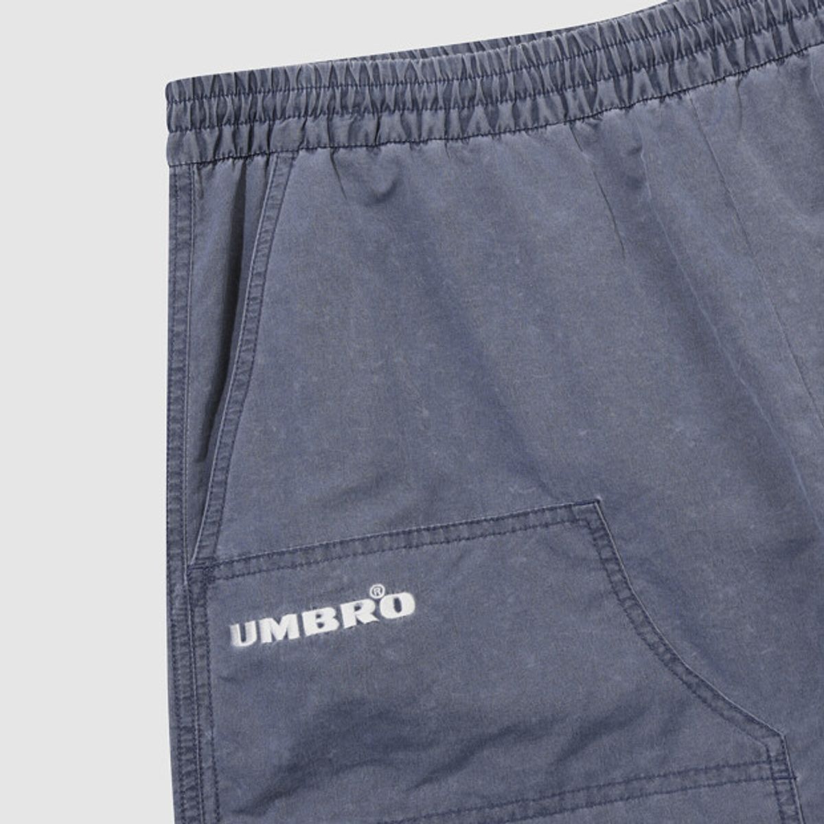 엄브로(UMBRO) HBL 엄그레이 워싱 6부 버뮤다 우븐 반바지 블루 UR121CHP21
