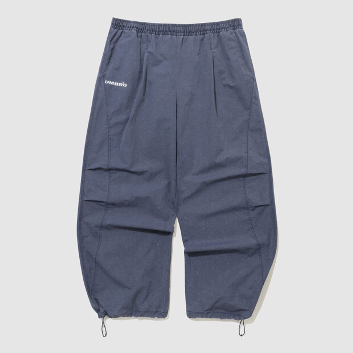 엄브로(UMBRO) HBL 엄그레이 워싱 파라슈트 와이드 조거 2WAY 팬츠 블루 UR123CPT21