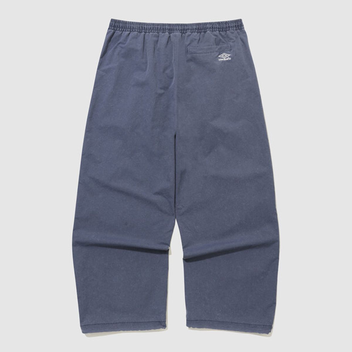 엄브로(UMBRO) HBL 엄그레이 워싱 파라슈트 와이드 조거 2WAY 팬츠 블루 UR123CPT21