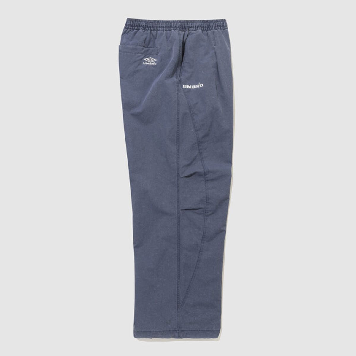 엄브로(UMBRO) HBL 엄그레이 워싱 파라슈트 와이드 조거 2WAY 팬츠 블루 UR123CPT21