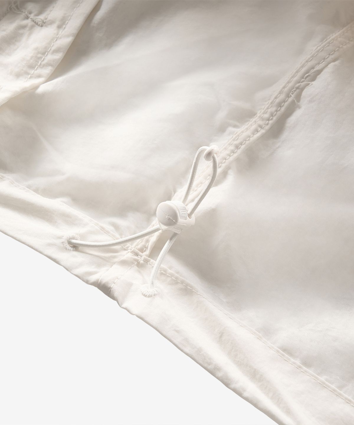 뉴발란스(NEW BALANCE) NBNAG2W322 / WOMEN 에센셜 후드 우븐 자켓 (CREAM)