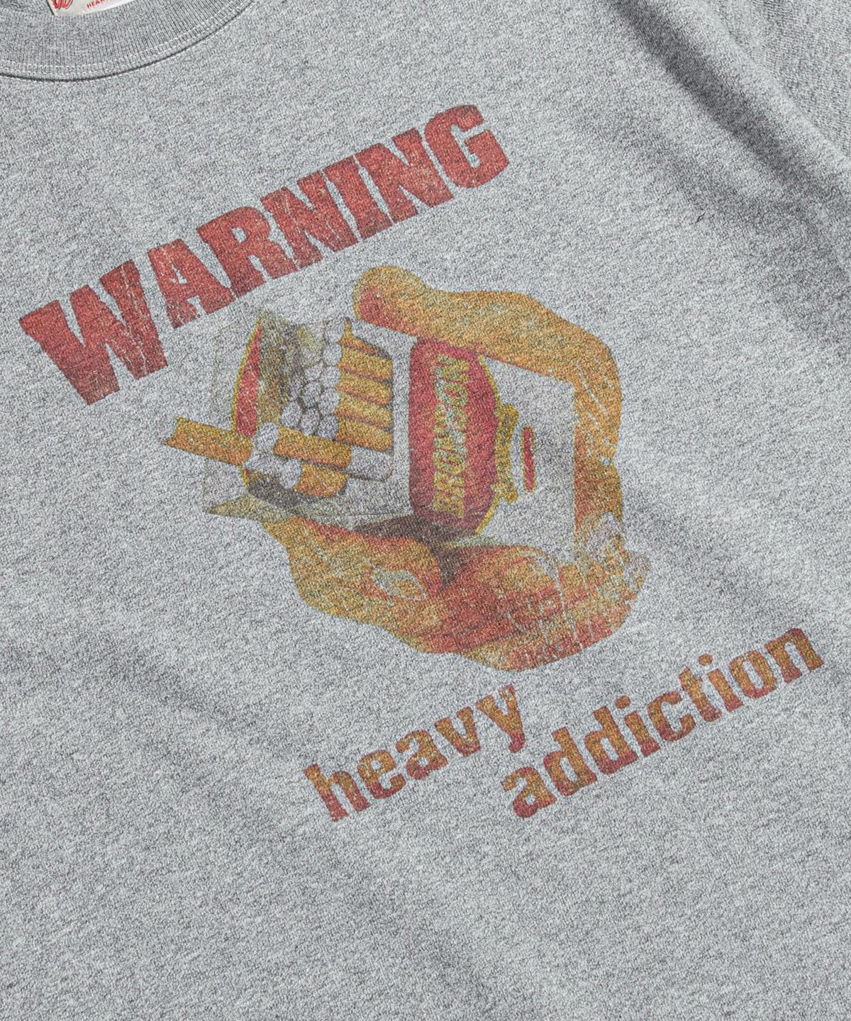 브론슨(BRONSON) Tobacco Warning Loopwheeled Graphic Tee Melange