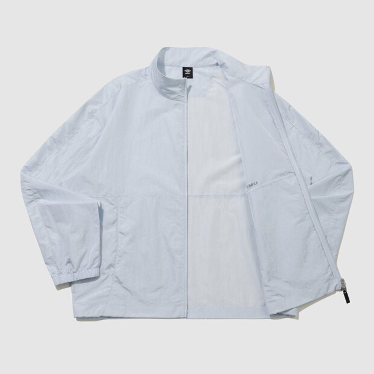 엄브로(UMBRO) 클래식 플러스 스탠넥 바람막이 자켓 스카이블루 UR124CJK33