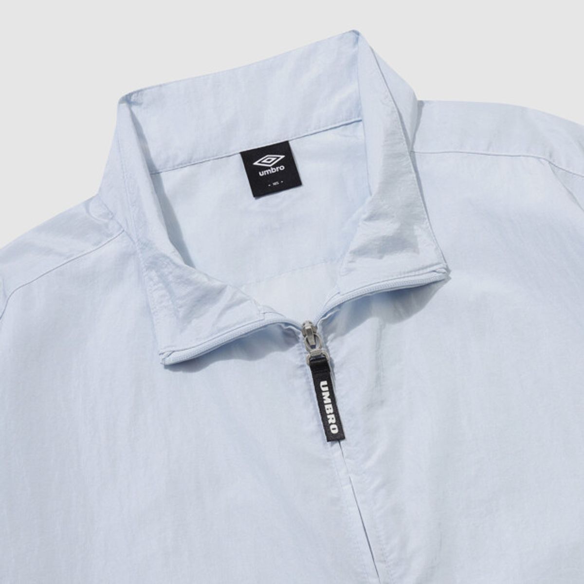 엄브로(UMBRO) 클래식 플러스 스탠넥 바람막이 자켓 스카이블루 UR124CJK33