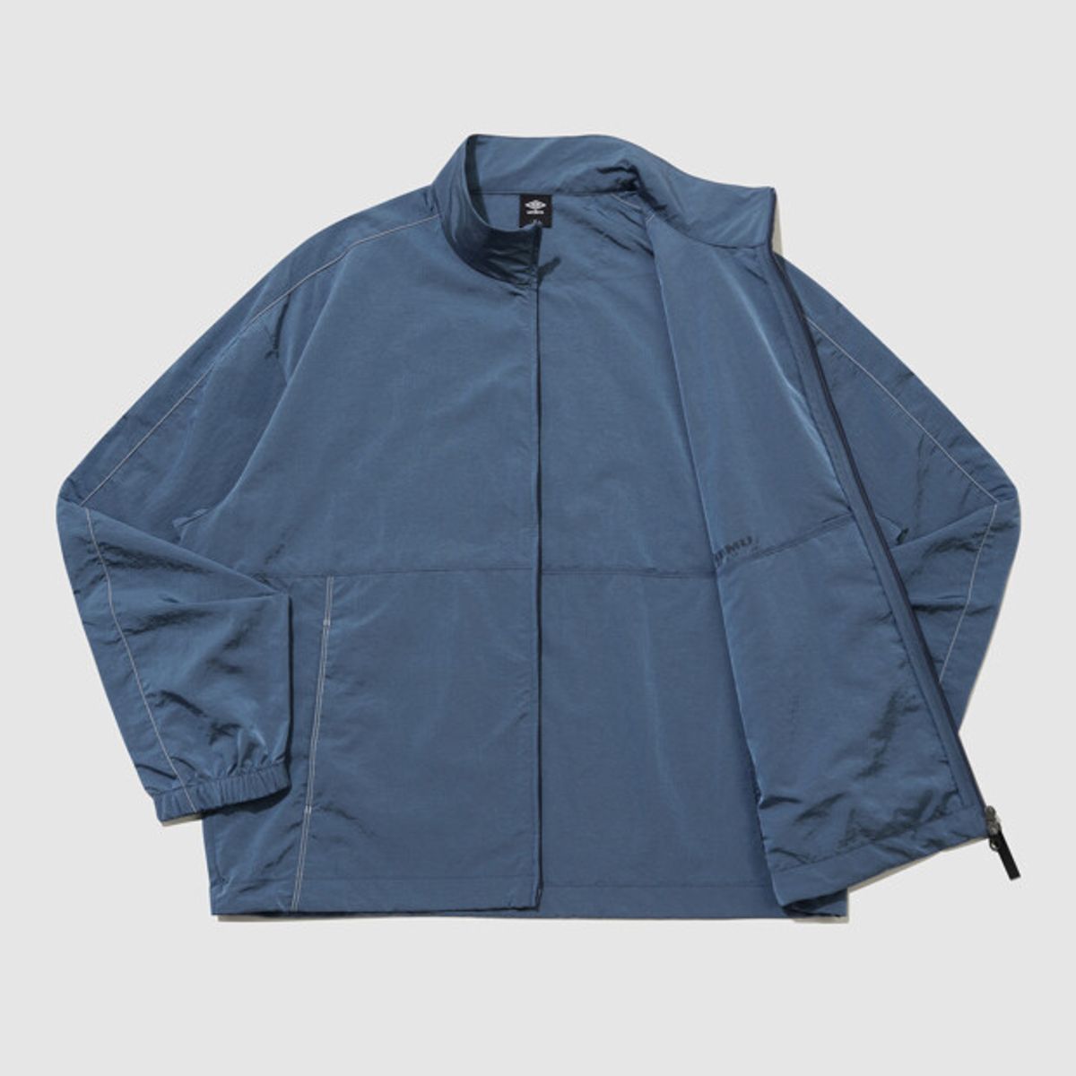 엄브로(UMBRO) 클래식 플러스 스탠넥 바람막이 자켓 블루 UR124CJK33