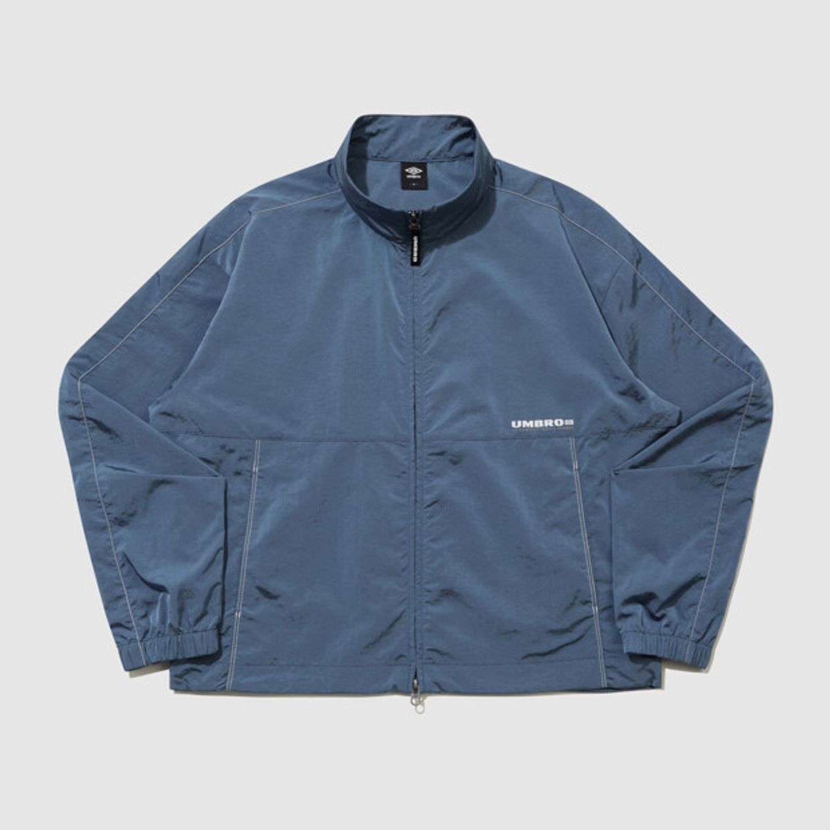 엄브로(UMBRO) 클래식 플러스 스탠넥 바람막이 자켓 블루 UR124CJK33