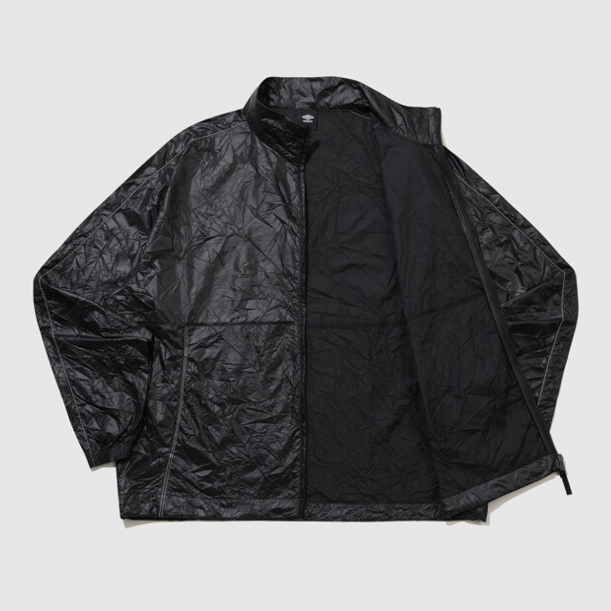 엄브로(UMBRO) 클래식 플러스 스탠넥 바람막이 자켓 블랙 UR124CJK33