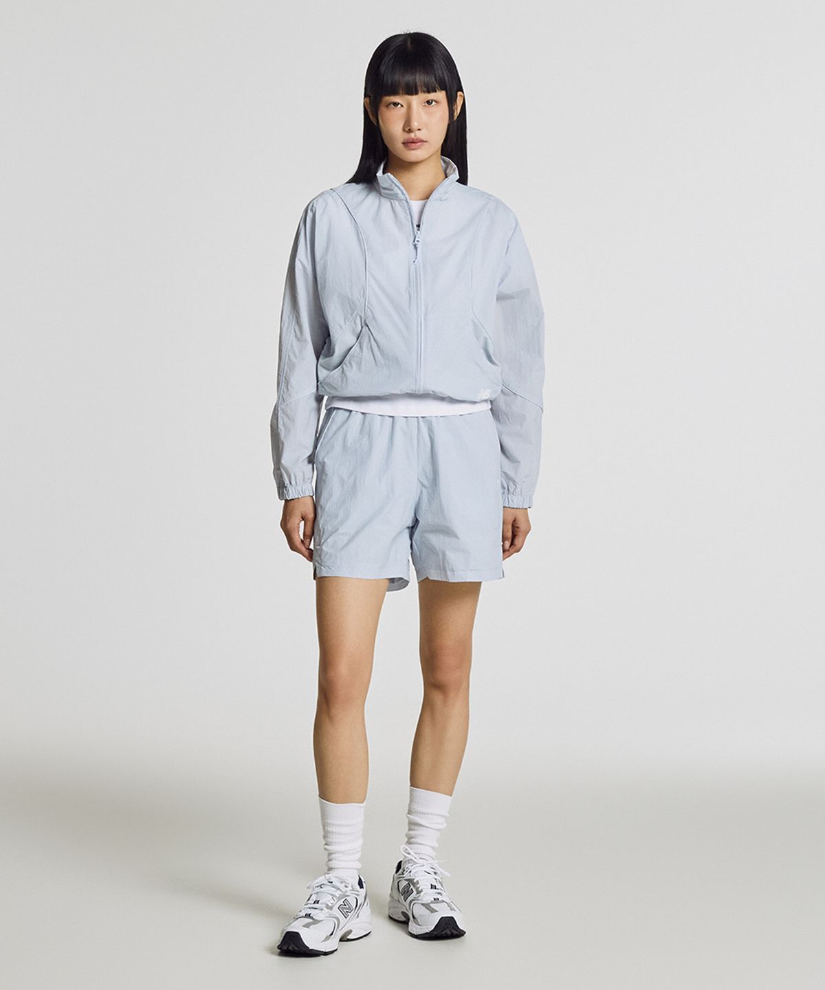 뉴발란스(NEW BALANCE) NBNAG2W412 / WOMEN 에센셜 경량 스탠넥 우븐자켓 (LIGHT BLUE)
