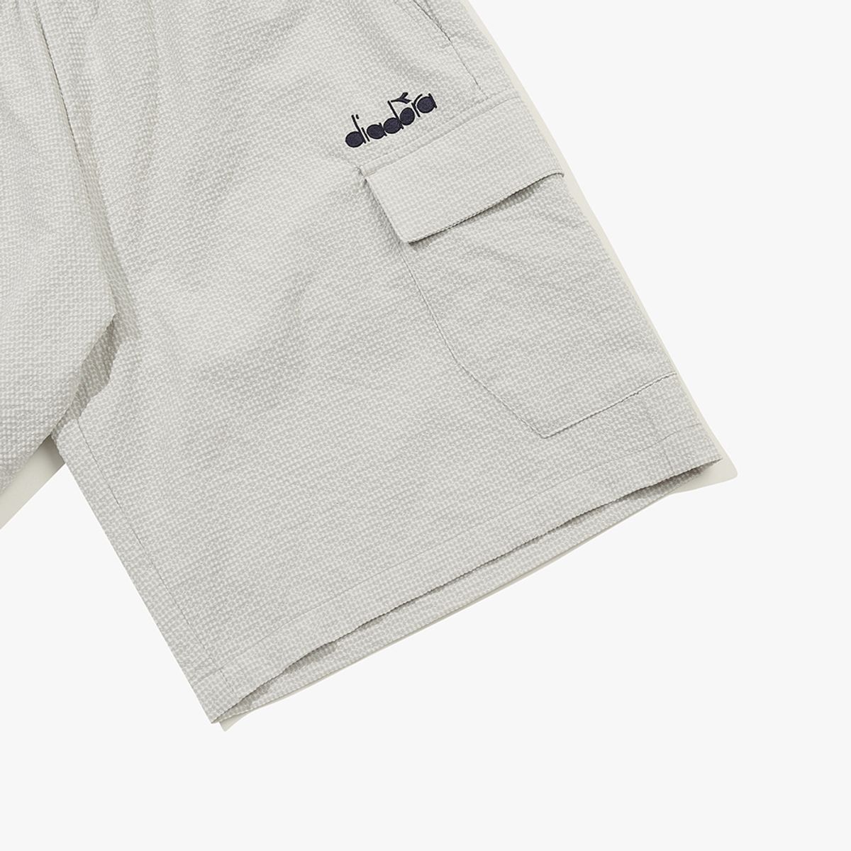 디아도라(diadora) 에어서커 카고 하프팬츠 BEIGE