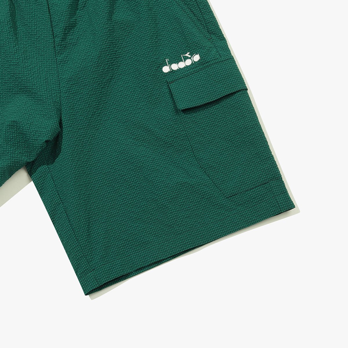 디아도라(diadora) 에어서커 카고 하프팬츠 GREEN