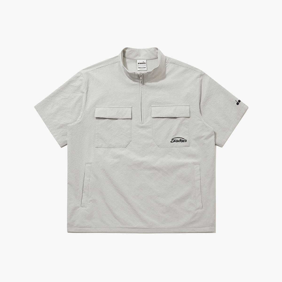 디아도라(diadora) 에어서커 반팔 아노락 BEIGE