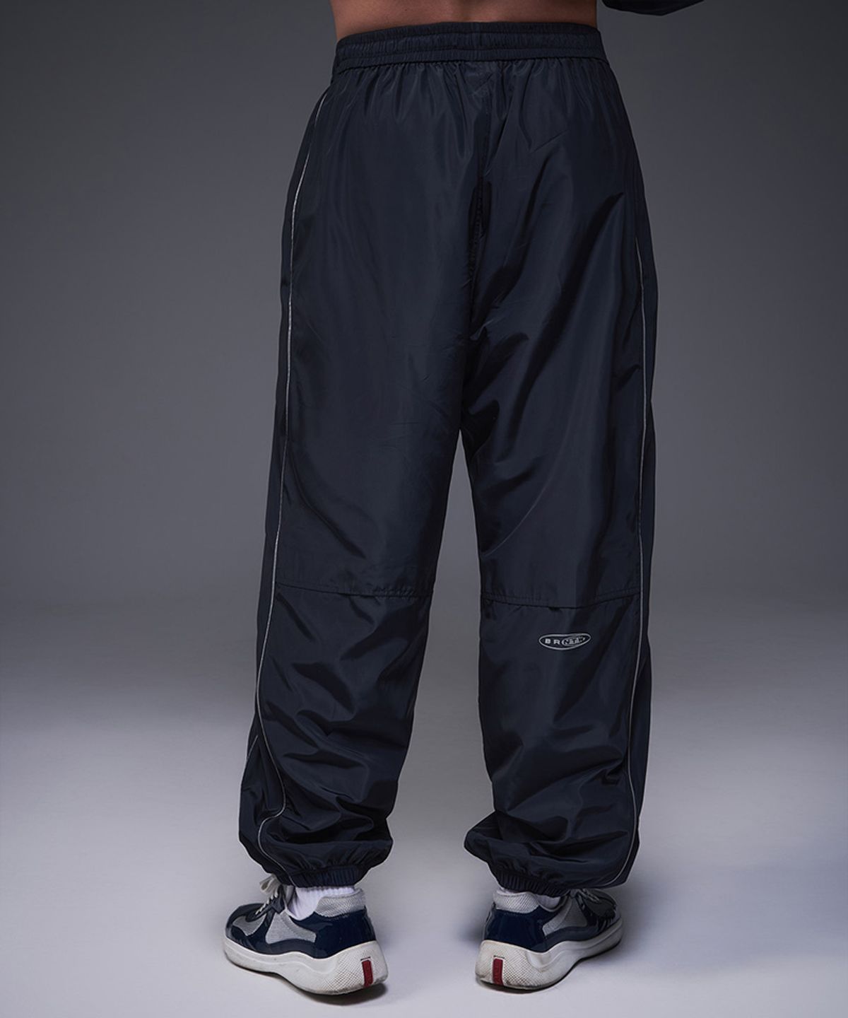 본투윈(BORN TO WIN) WOVEN PIPING TRACK PANTS [NAVY]