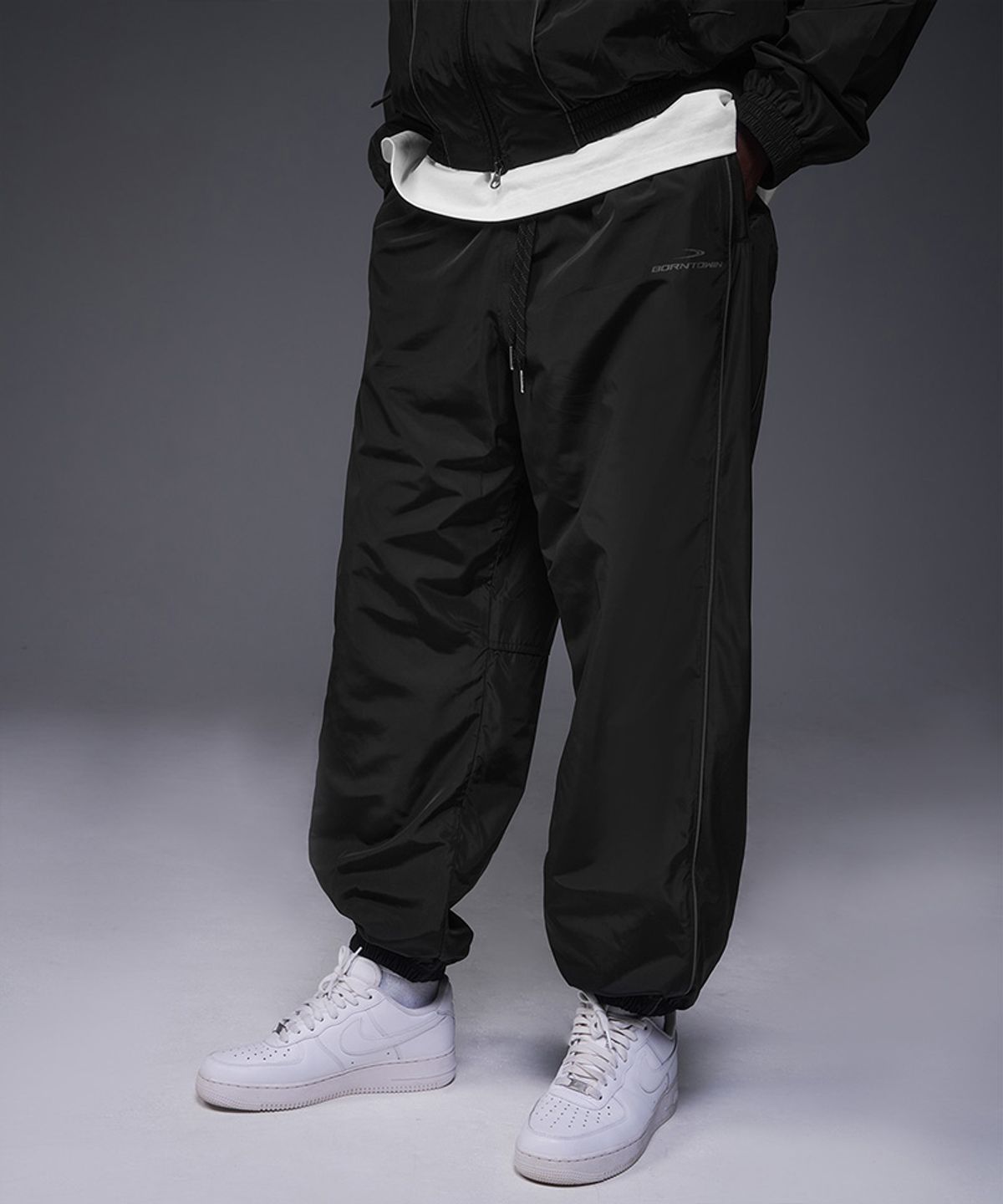 본투윈(BORN TO WIN) WOVEN PIPING TRACK PANTS [BLACK]
