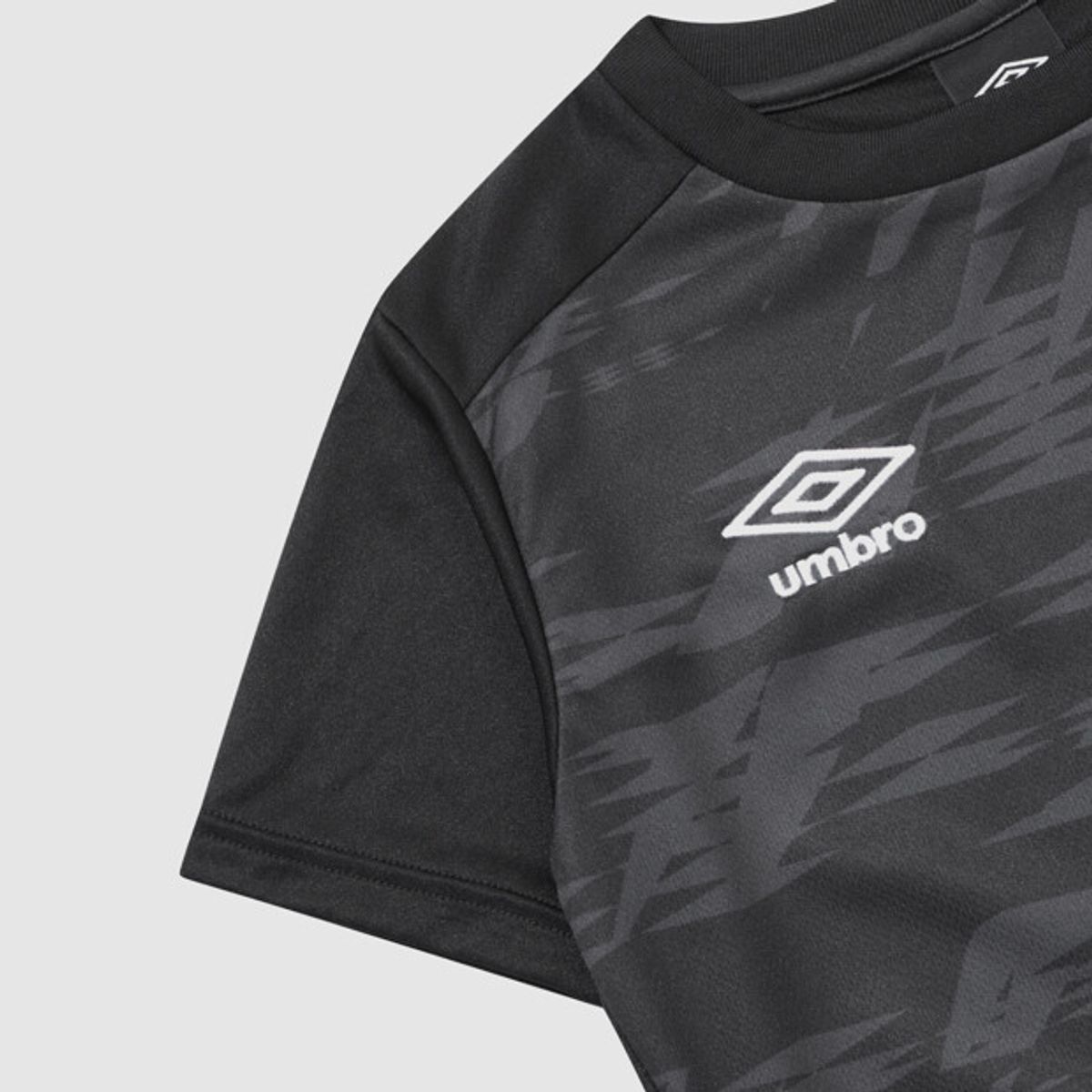엄브로(UMBRO) 주니어 그래픽 반팔 게임 셔츠 블랙 UQ116SRS22