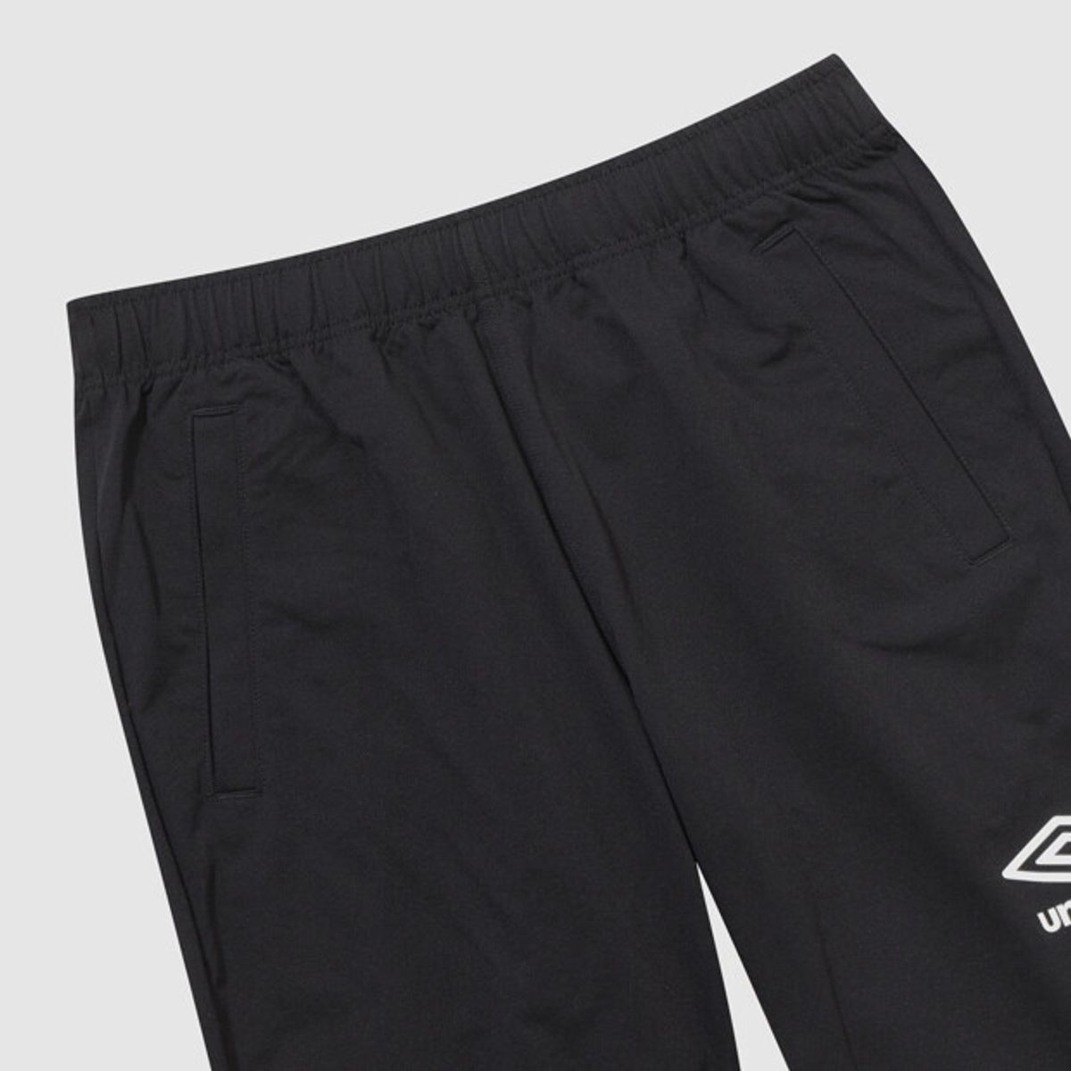엄브로(UMBRO) 주니어 웜업 팬츠 블랙 UQ116SFP21
