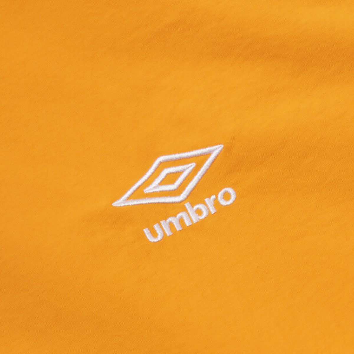 엄브로(UMBRO) 클래식 반팔 스탠넥 아노락 오렌지 UR124CWT31