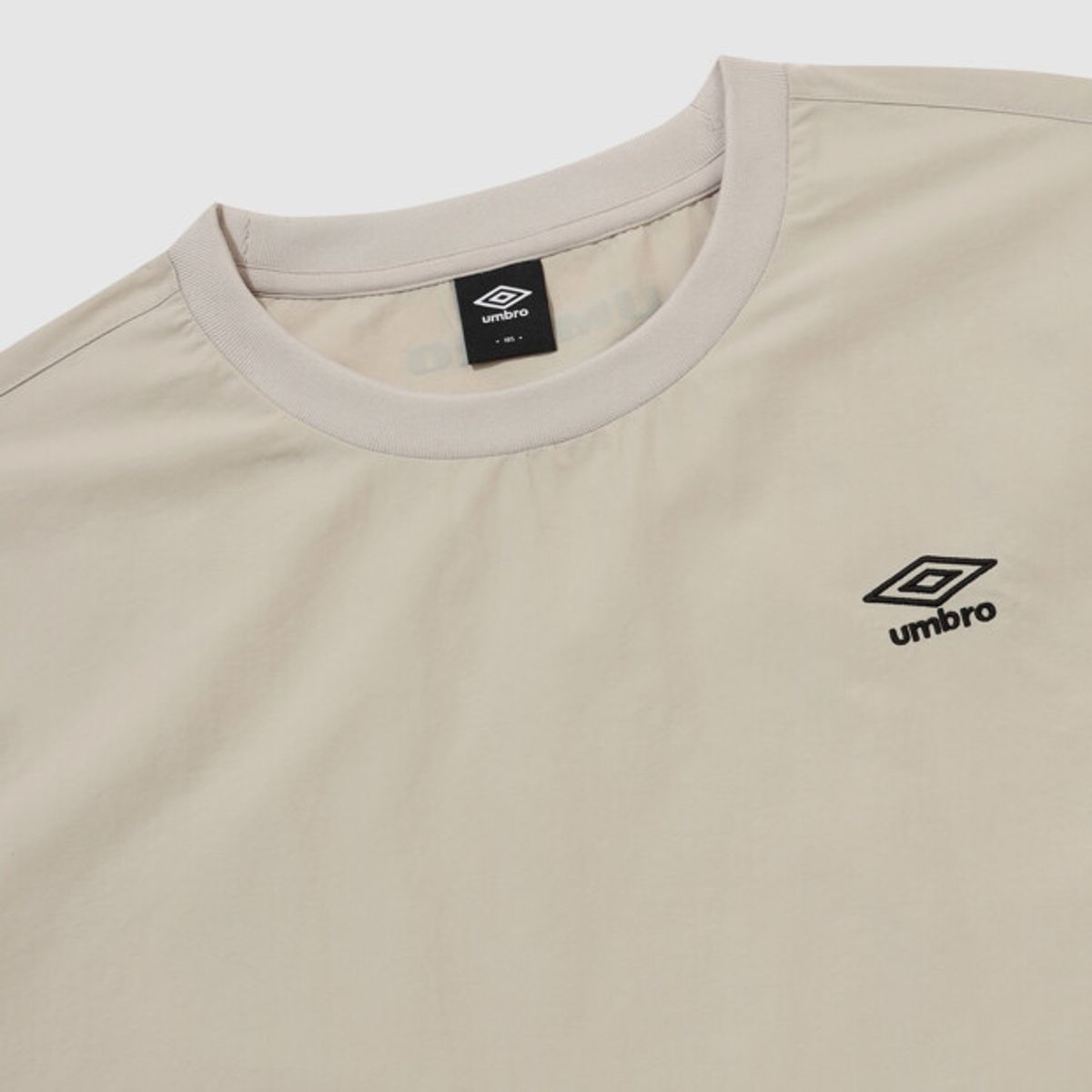 엄브로(UMBRO) 클래식 반팔 피스테 베이지 UR121CWT32
