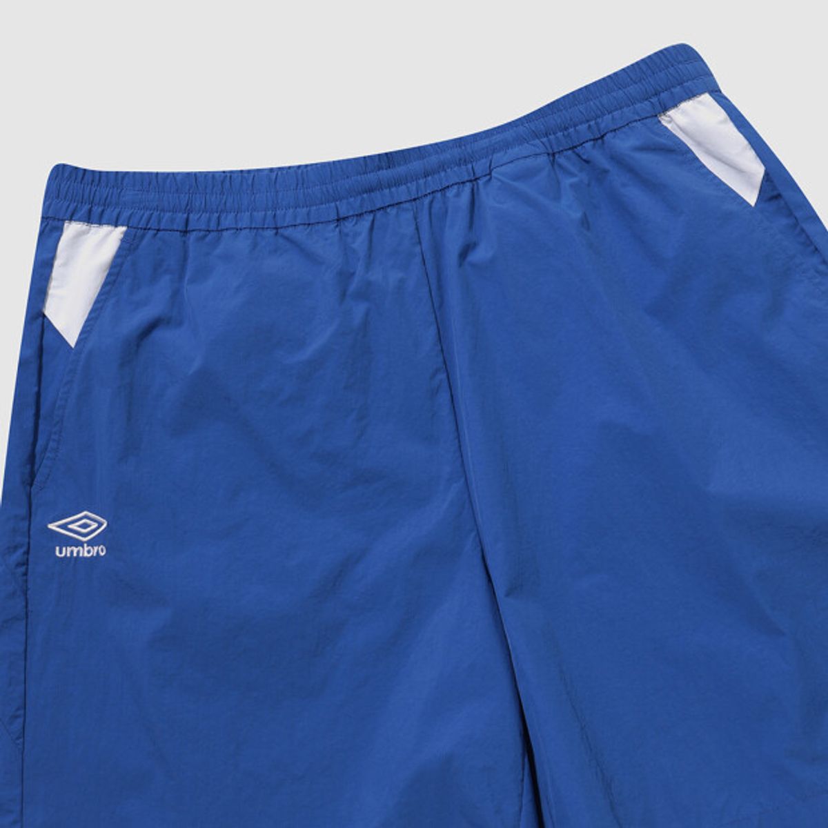 엄브로(UMBRO) 팝러쉬 컬러블럭 4.5부 반바지 블루 UR121CHP35