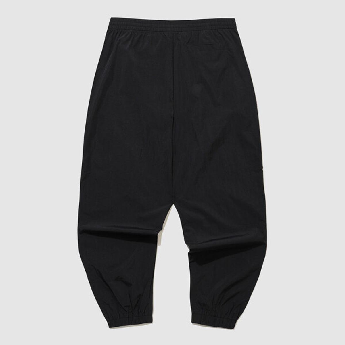 엄브로(UMBRO) 팝러쉬 컬러블럭 조거 팬츠 블랙 UR121CPT32