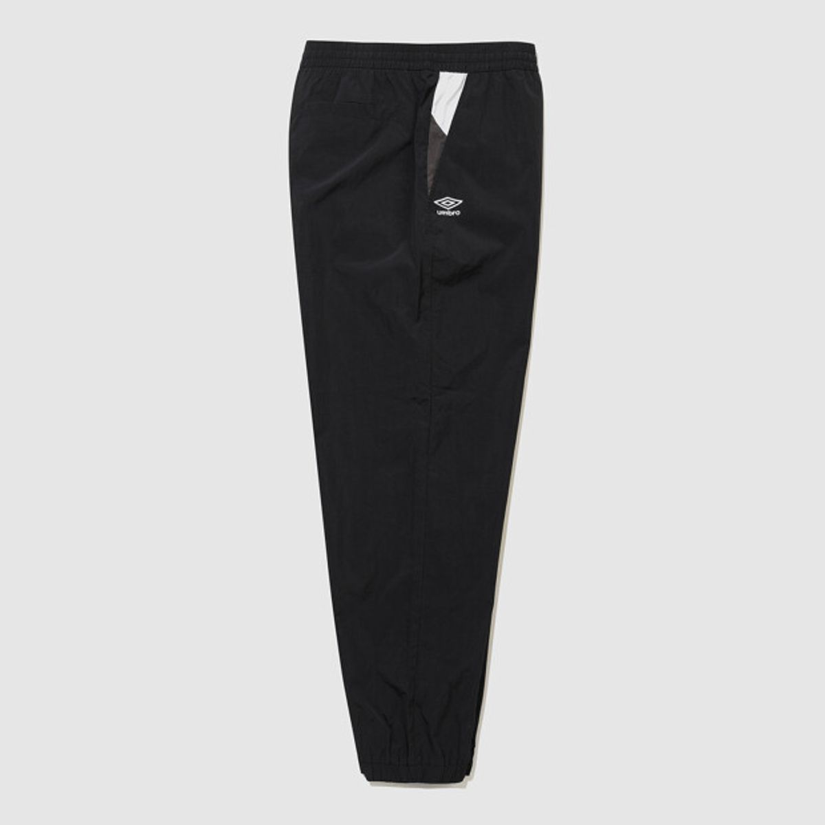 엄브로(UMBRO) 팝러쉬 컬러블럭 조거 팬츠 블랙 UR121CPT32