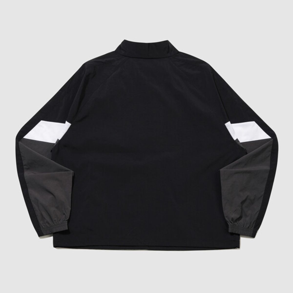 엄브로(UMBRO) 팝러쉬 컬러블럭 스탠넥 아노락 블랙 UR123CWT34