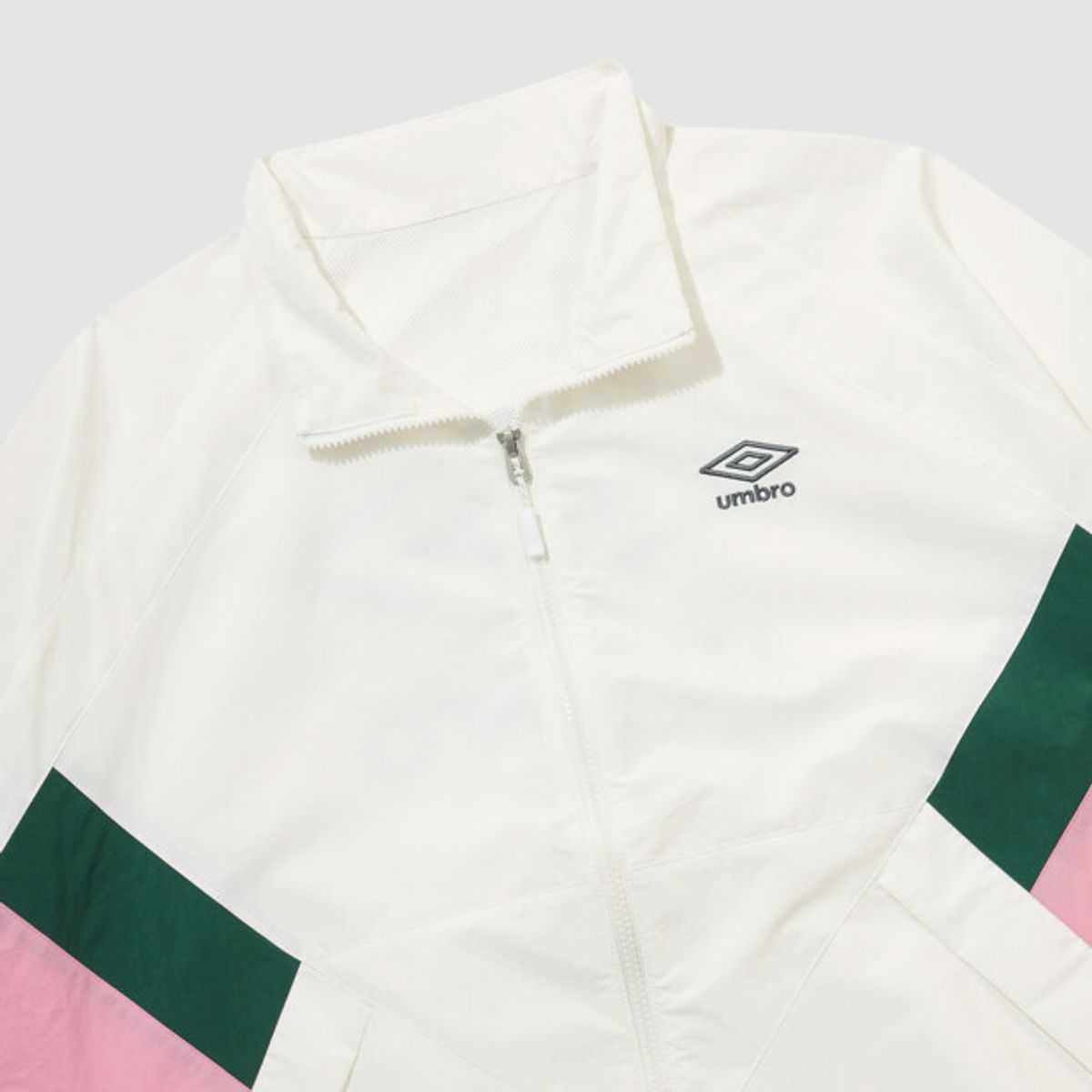 엄브로(UMBRO) 팝러쉬 컬러블럭 스탠넥 바람막이 자켓 아이보리 UR123CJK34