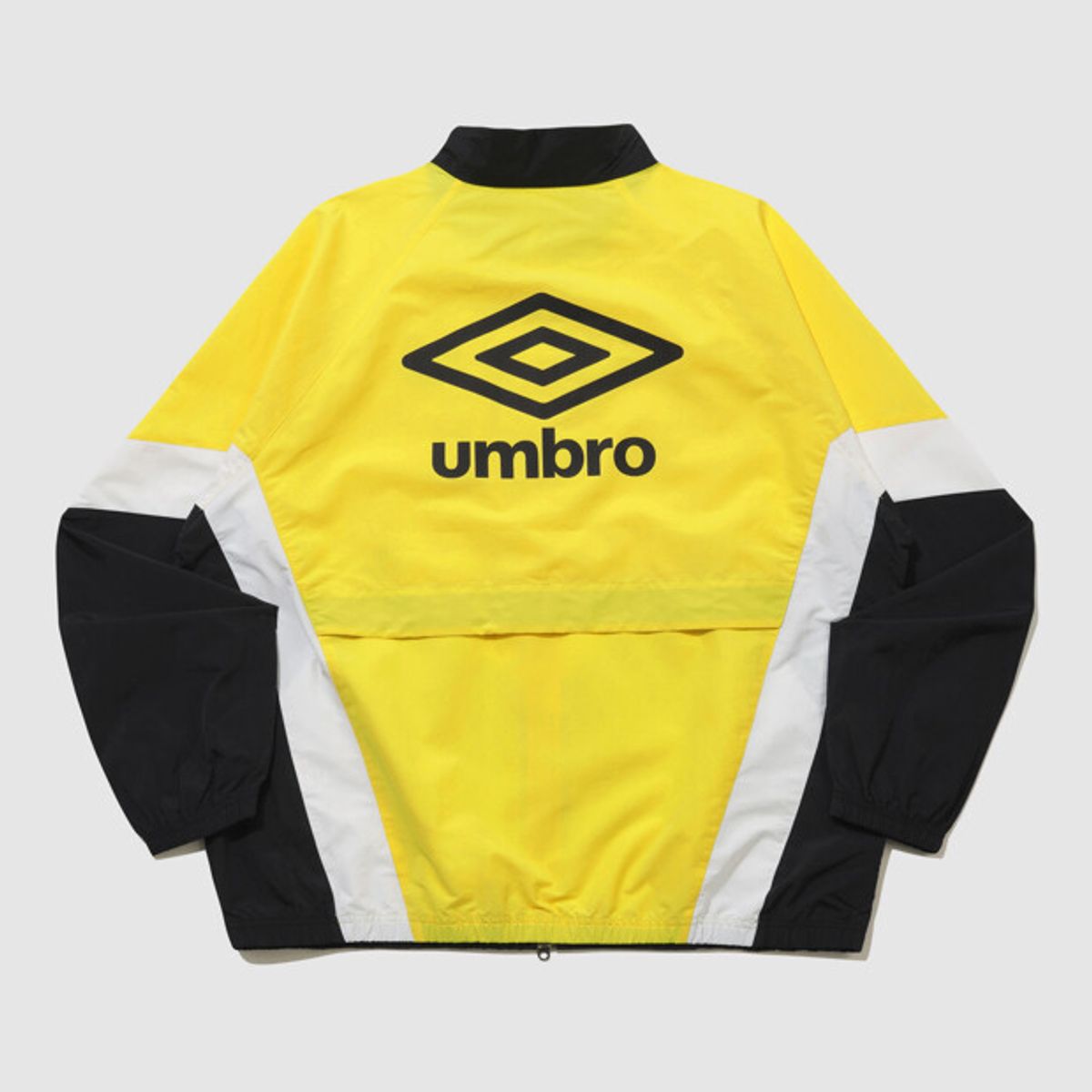 엄브로(UMBRO) 팝러쉬 컬러블럭 스탠넥 바람막이 자켓 옐로우 UR123CJK34
