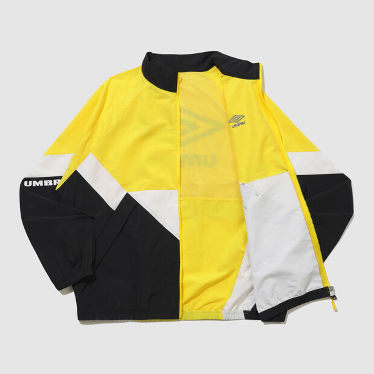 엄브로(UMBRO) 팝러쉬 컬러블럭 스탠넥 바람막이 자켓 옐로우 UR123CJK34