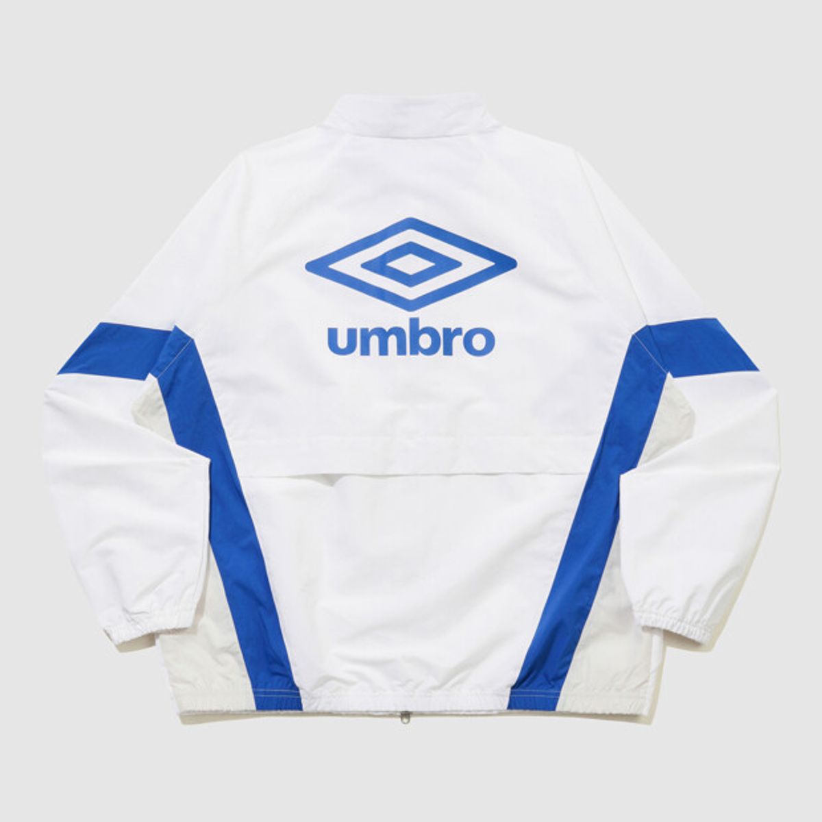 엄브로(UMBRO) 팝러쉬 컬러블럭 스탠넥 바람막이 자켓 화이트 UR123CJK34
