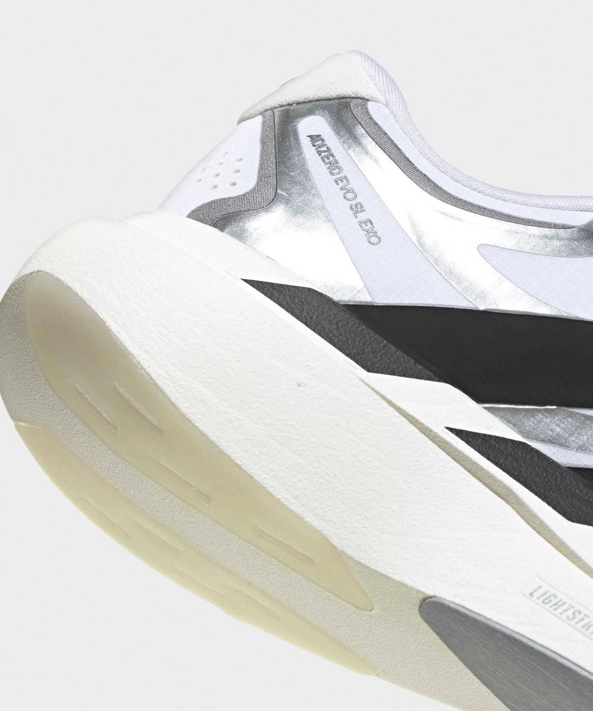 아디다스(ADIDAS) 아디제로 EVO SL EXO W - 화이트:블랙:아이언메탈릭 / KI4782