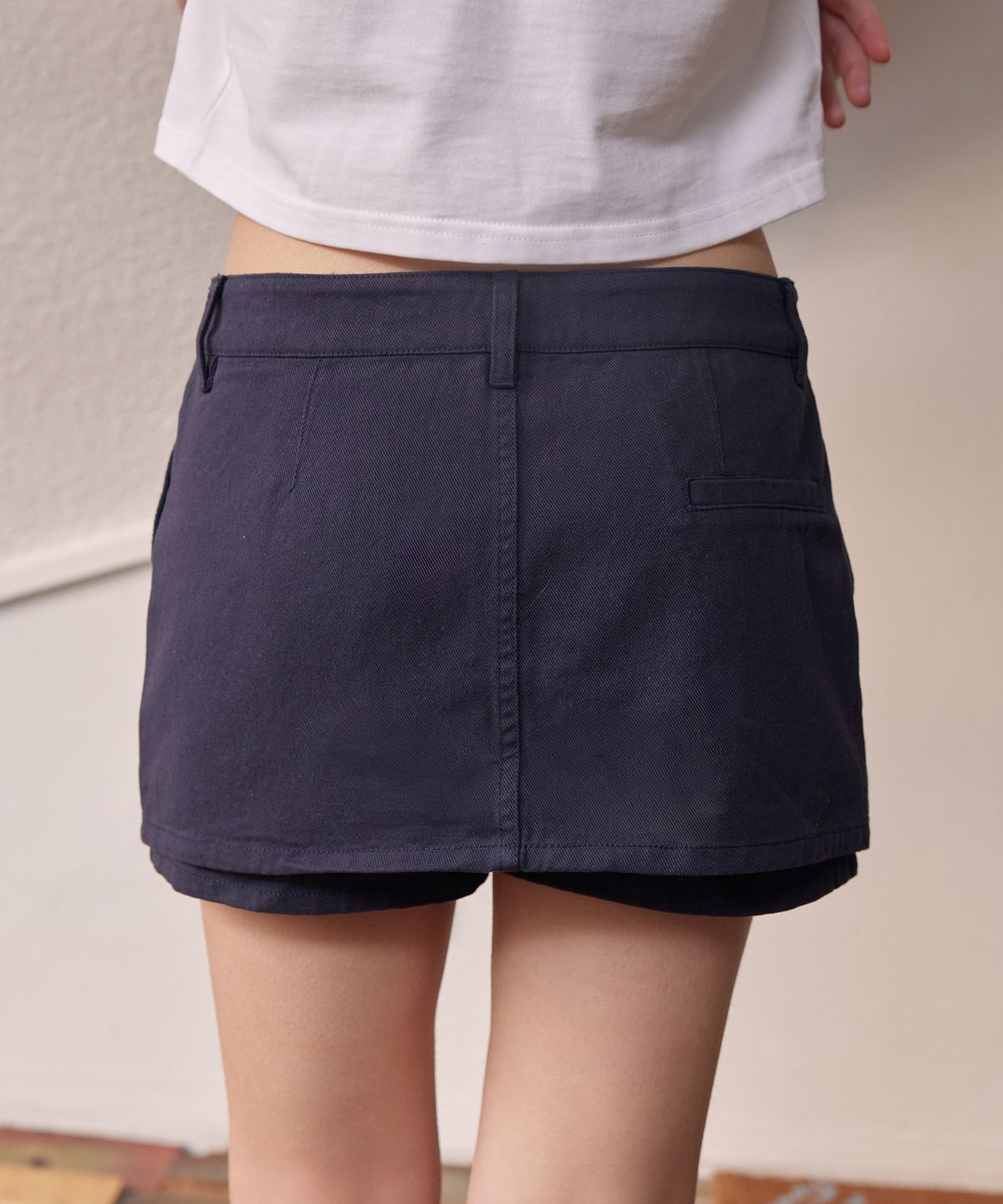 라피네아뜰리에(RAFFINE ATELIER) 로우라이즈 트윌 치마바지 네이비