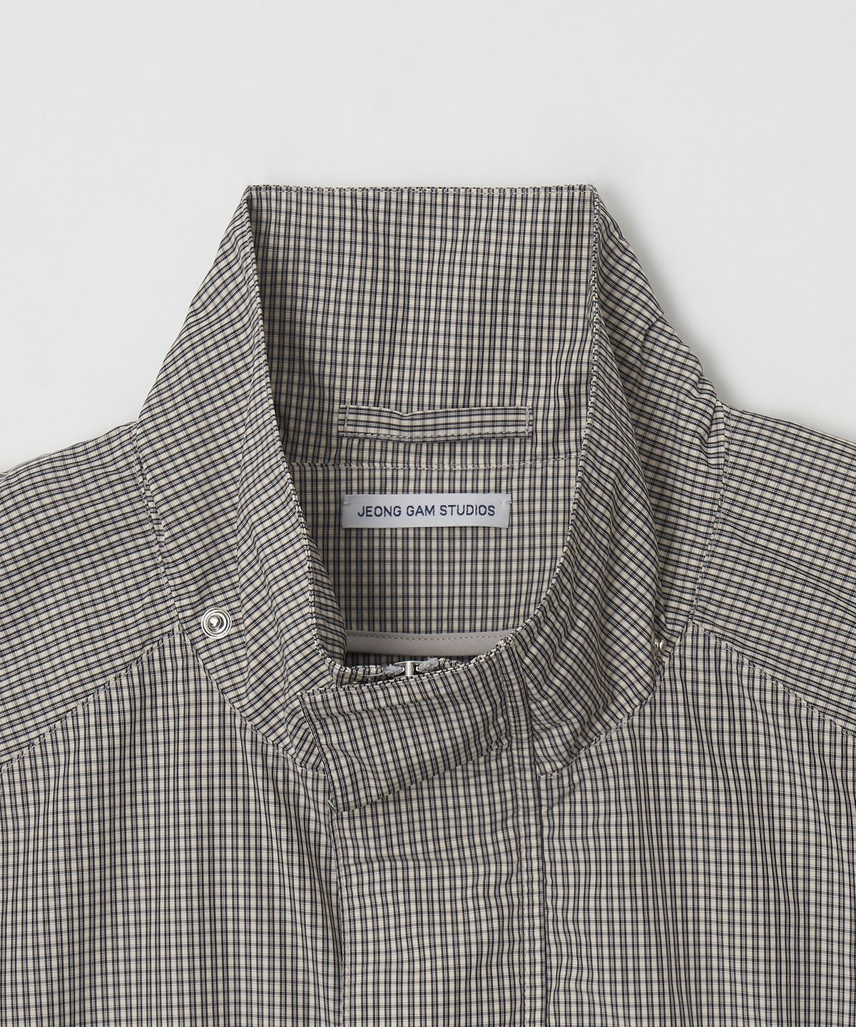 정감 스튜디오(JEONGGAM STUDIOS) Check High Neck Jumper_2 color