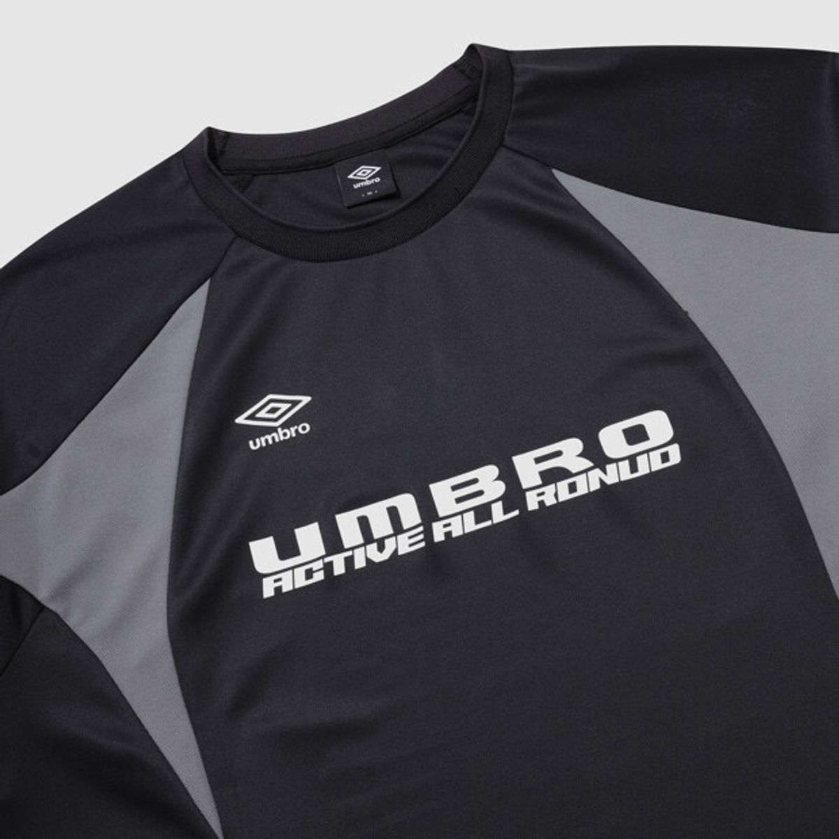 엄브로(UMBRO) 올라운드 기능성 반팔 게임 셔츠 블랙 UR121SRS39
