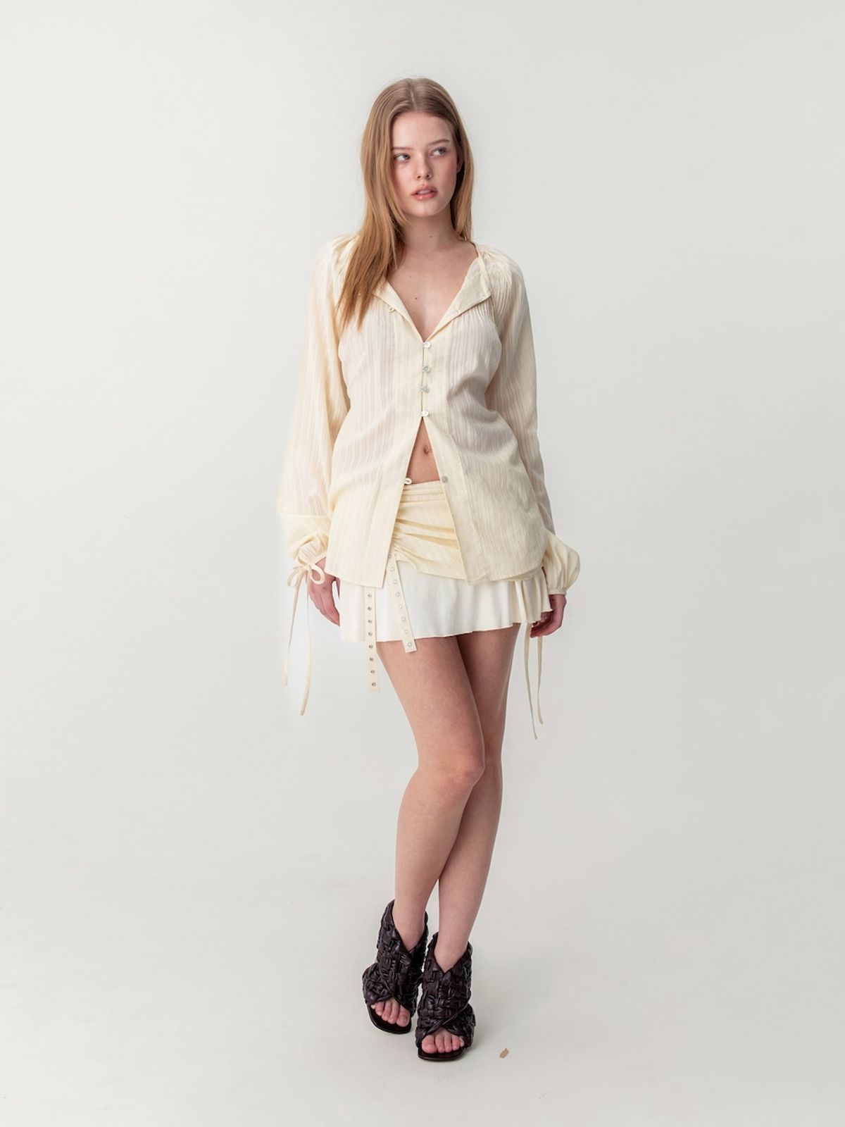 글로니(GLOWNY) MISTY SHEER MINI SKIRT (LIGHT BEIGE)