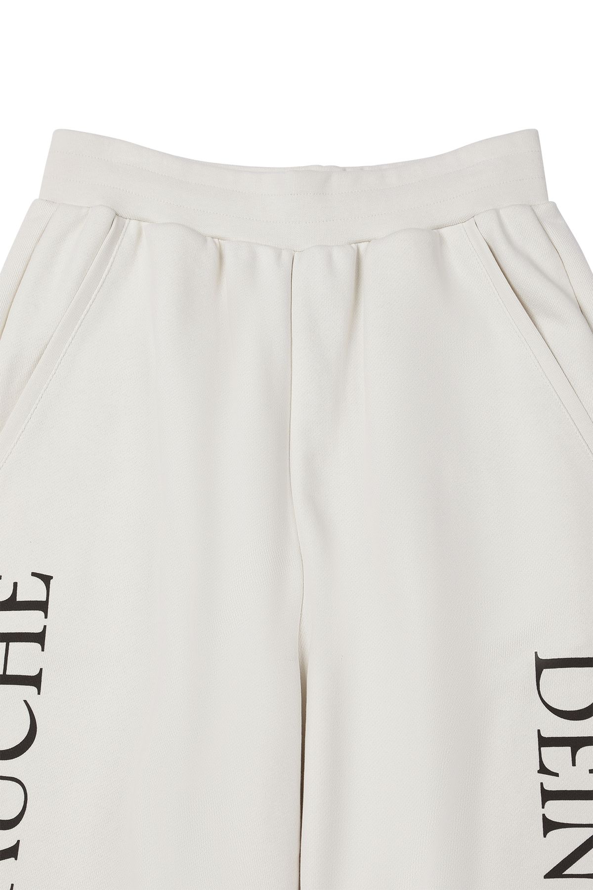 다이닛(DEINET) GERMAN LETTERING SWEATPANTS IN IVORY