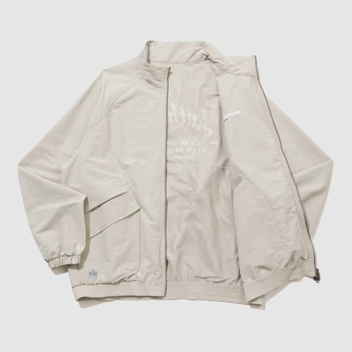 엄브로(UMBRO) 린넨라이크 스탠넥 블루종 바람막이 자켓 베이지 UR121CJK35