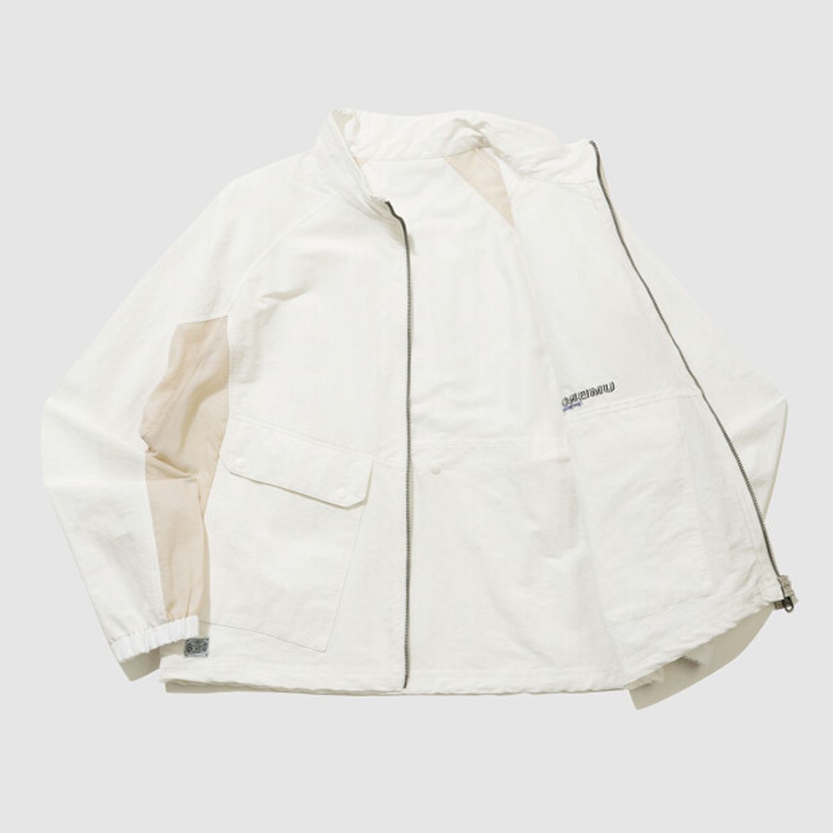 엄브로(UMBRO) 린넨라이크 우먼스 스탠넥 바람막이 자켓 아이보리 UR122CJK36