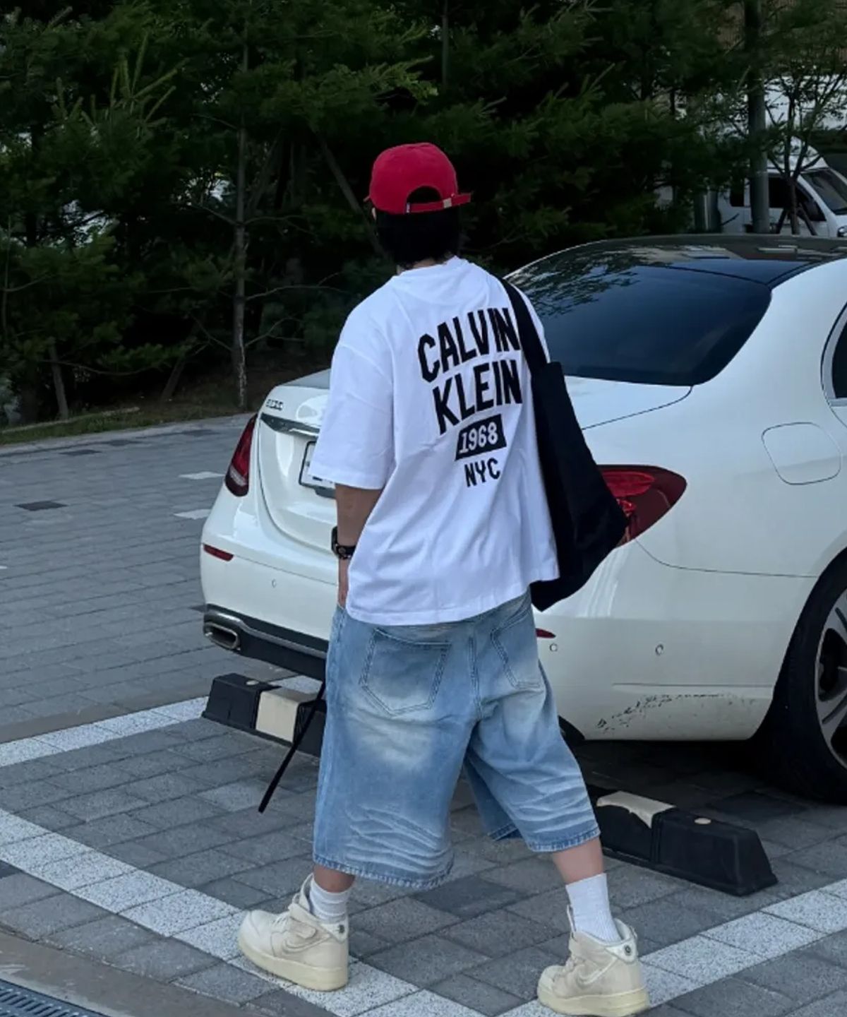 캘빈클라인 진(CALVIN KLEIN JEANS) 인더시티 릴렉스드핏 그래픽 티 화이트 4RF295G YAF